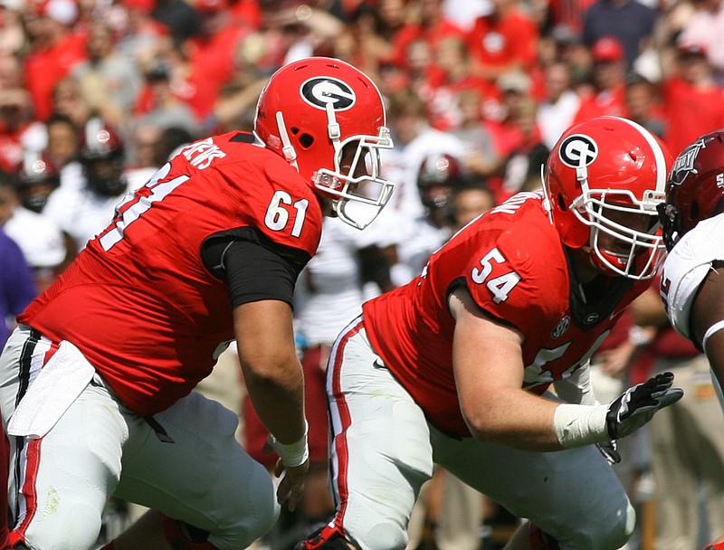 After starting 13 games last season at left guard, Brandon Kublanow (54) is moving to center this season to replace three-year starter David Andrews (61).