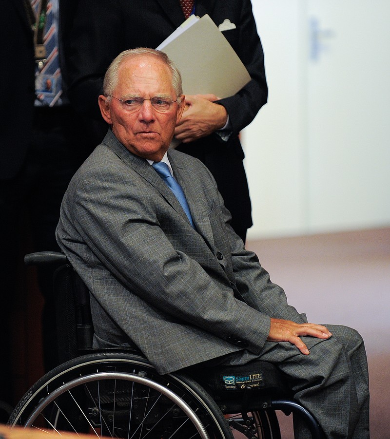 
              German Finance Minister Wolfgang Schaeuble during a meeting of eurozone finance ministers at the EU Council building in Brussels on Friday, Aug. 14, 2015. (AP Photo/Laurent Dubrule)
            