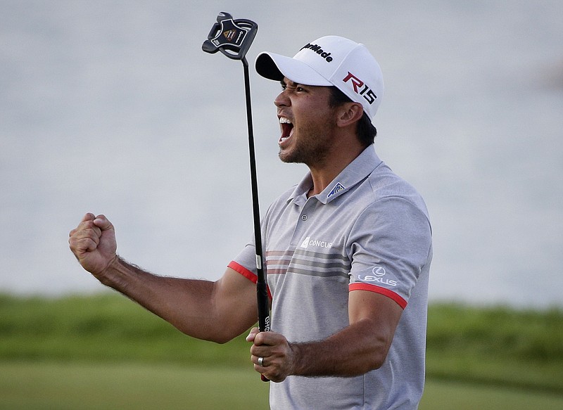 Jason Day, of Australia, reacts to his birdie on the 17th hole during the third round of the PGA Championship golf tournament Saturday, Aug. 15, 2015, at Whistling Straits in Haven, Wis. 