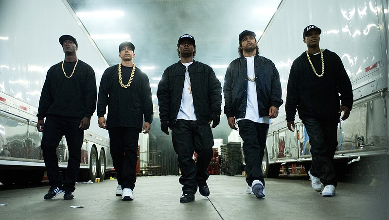 
              This photo provided by Universal Pictures shows, Aldis Hodge, from left, as MC Ren, Neil Brown, Jr. as DJ Yella, Jason Mitchell as Eazy-E, O’Shea Jackson, Jr. as Ice Cube and Corey Hawkins as Dr. Dre, in the film, “Straight Outta Compton." The movie released in U.S. theaters on Friday, Aug. 14, 2015. (Jaimie Trueblood/Universal Pictures via AP)
            
