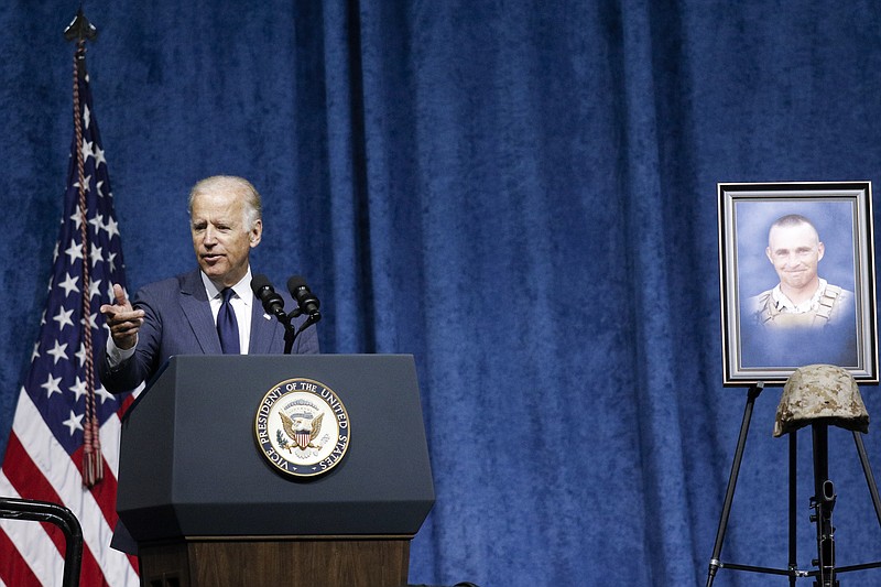 Staff photo by Doug Strickland / Vice President Joseph Biden speaks at a memorial for the five military servicemen killed here in the July 16 attacks on two local military facilities.