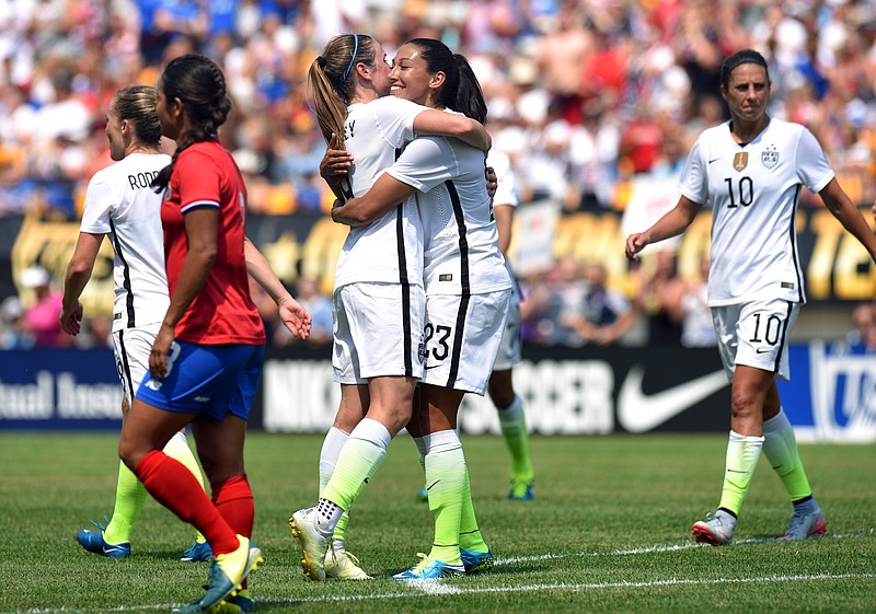 United States' midfielder Heather O'Reilly (9) celebrates with Christen Press (23) after Press' goal during the first half of a women's friendly soccer match against Costa Rica on Sunday, Aug. 16, 2015, in Pittsburgh. The U.S. won 8-0.