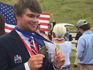 Gordon Lee High School senior Mason Sims poses with the United States team gold and individual silver medals he won this weekend at the World Youth Fly Fishing Championships in Vail, Colo.