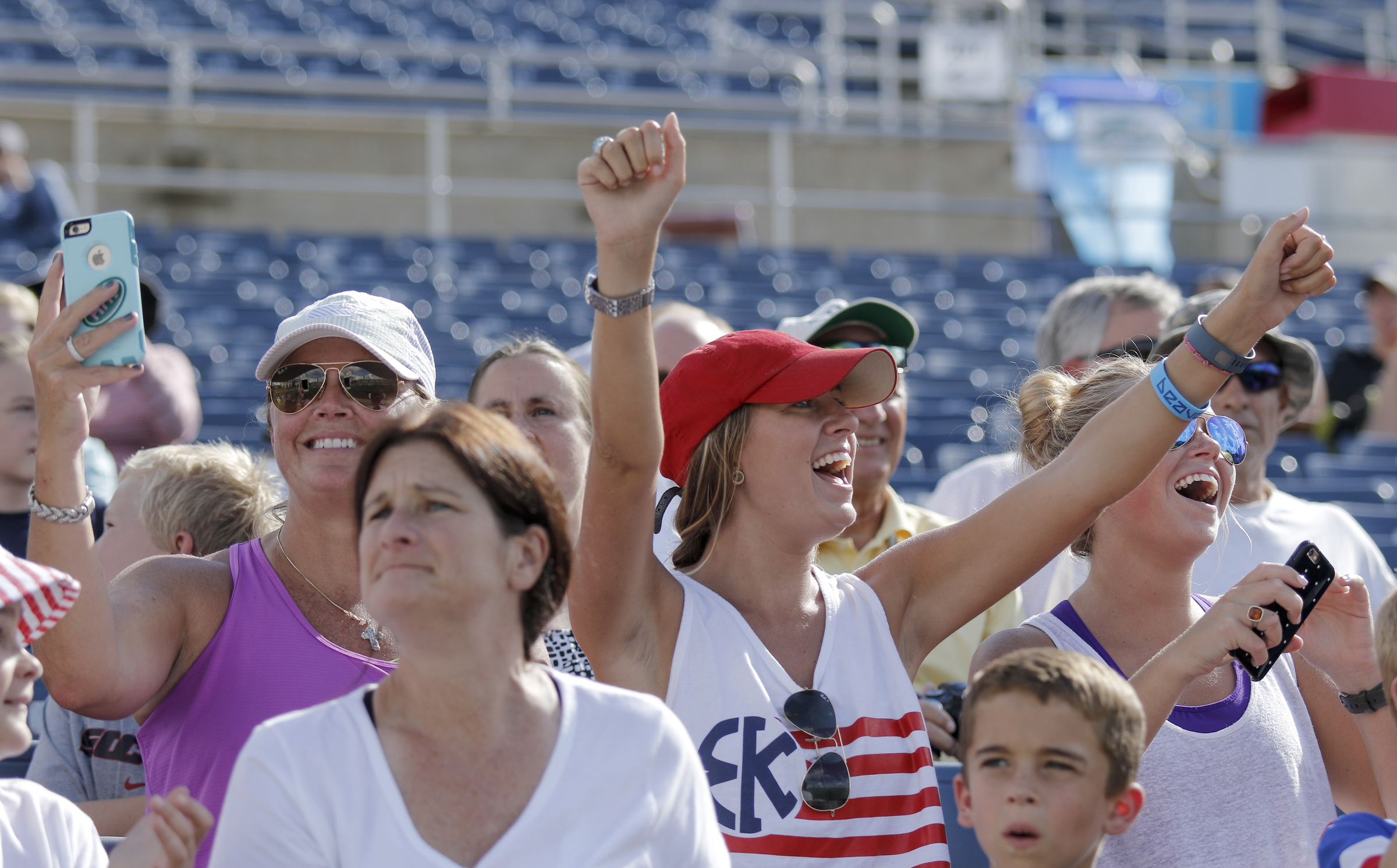Fans react as the U.S. Women's National Soccer Team takes the field for practice at Finley Stadium on Tuesday, Aug. 18, 2015, in Chattanooga. The team plays Costa Rica on Wednesday at Finley Stadium.