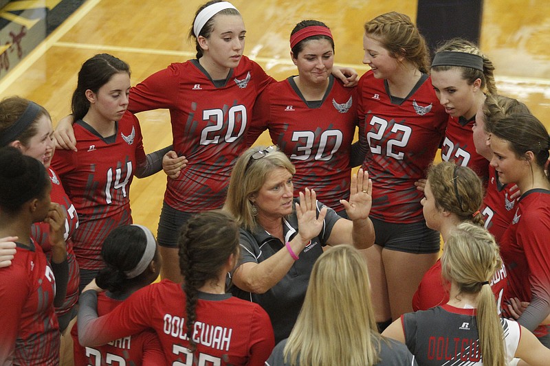 Ooltewah volleyball coach Elaine Peigen directs players during a timeout in their District 5-AAA high school volleyball championship match against East Hamilton on Wednesday, Oct. 8, 2014, at Soddy-Daisy High School in Soddy-Daisy, Tenn.