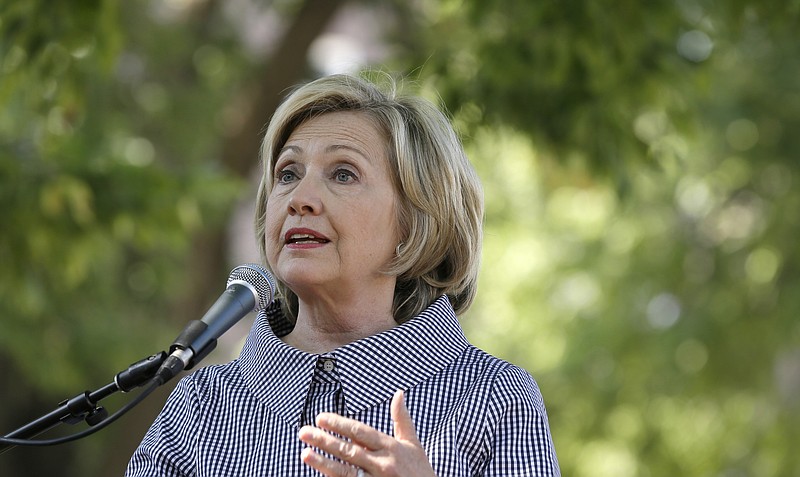 Democratic presidential candidate Hillary Rodham Clinton speaks at the Iowa State Fair in Des Moines, Iowa, last week. The State Department review of Clinton's emails so far has found as many as 305 messages that could contain classified information and require further review by federal agencies, the department said Monday.