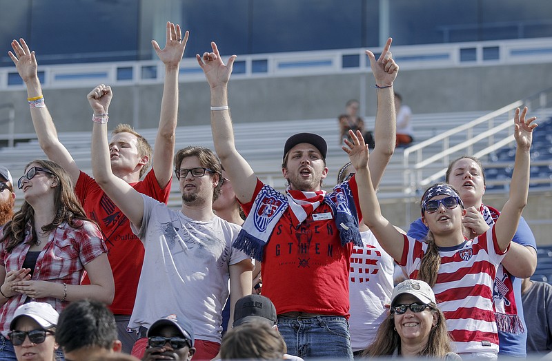 Fans react as the U.S. Women's National Soccer Team takes the field for practice at Finley Stadium on Tuesday, Aug. 18, 2015, in Chattanooga, Tenn. The team plays Costa Rica on Wednesday at Finley Stadium.