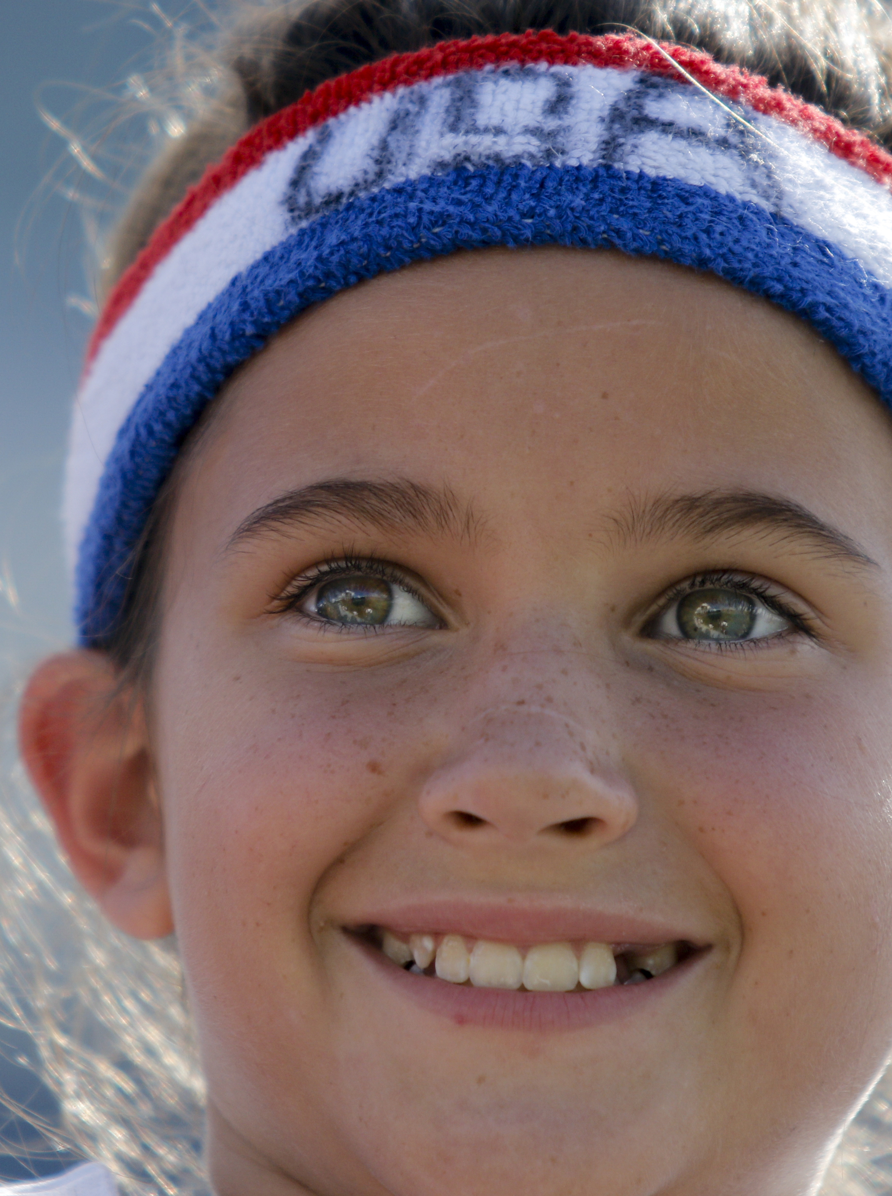 Ellison Ball wears a USA headband as she watches the U.S. Women's National Soccer Team practice at Finley Stadium on Tuesday, Aug. 18, 2015, in Chattanooga, Tenn. The team plays Costa Rica on Wednesday at Finley Stadium.