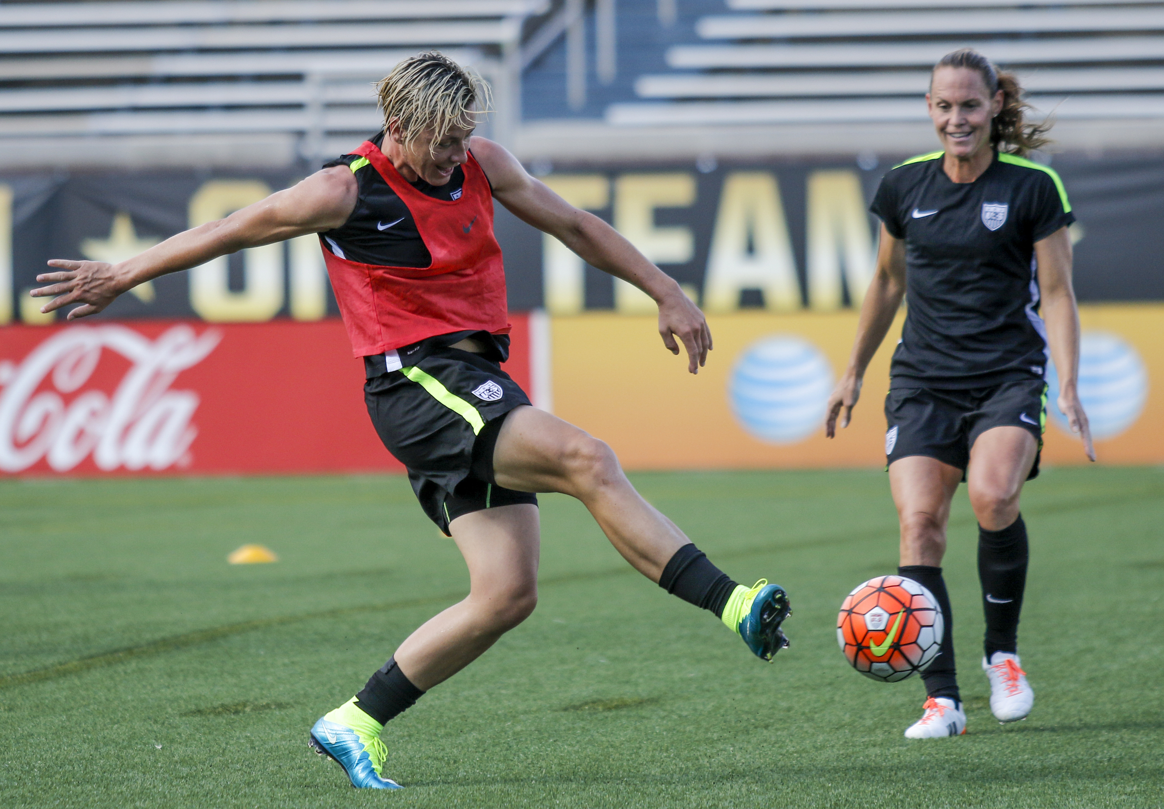 U.S. Women's National Soccer Team player Abby Wambach, left, clears the ball during practice at Finley Stadium on Tuesday, Aug. 18, 2015, in Chattanooga, Tenn. The team plays Costa Rica on Wednesday at Finley Stadium.