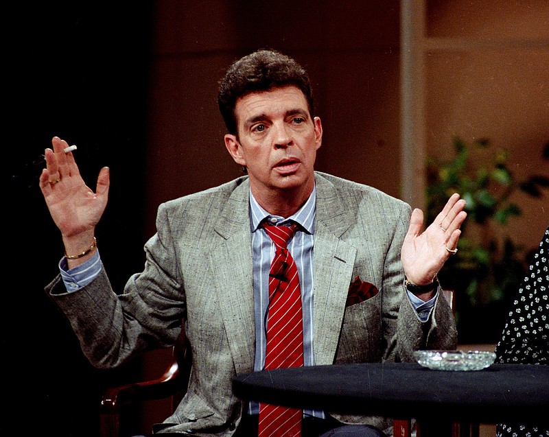 
              FILE - In this May 2, 1989 file photo, television talk show host Morton Downey Jr. appears in New York.  CNN will air a film about the controversial talk show host, "Evocateur: The Morton Down Jr. Movie," on Thursday, Aug. 20, 2015 at 9 p.m. EDT. (AP Photo/Marty Lederhandler, File)
            