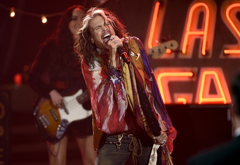 
              FILE - In this May 13, 2015 file photo, Steven Tyler performs at the American Idol XIV finale in Los Angeles. Tyler will be performing along with country band Loving Mary at the inaugural Pilgrimage Music & Cultural Festival in Tennessee. The two-day festival on a horse farm in Franklin will be held Sept. 26-27 and will also feature Willie Nelson, Sheryl Crow, Wilco, Weezer and The Decemberists. (Photo by Chris Pizzello/Invision/AP, File)
            