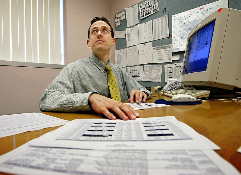 Dr. Andrew Lehmann works in his office at the Veterans Administration Hospital in Washington in this 2003 file photo.