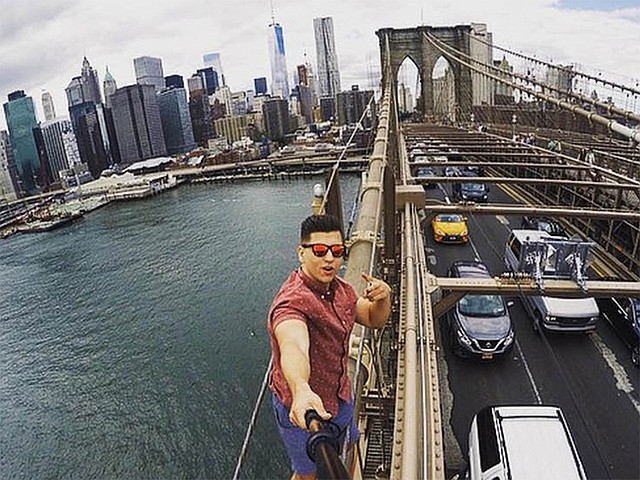 Chattanooga native David Karnauch was arrested by Hamilton County Sheriff deputies on a warrant from the New York Police Department for reckless endangerment after he took a selfie from the side of the Brooklyn Bridge. 