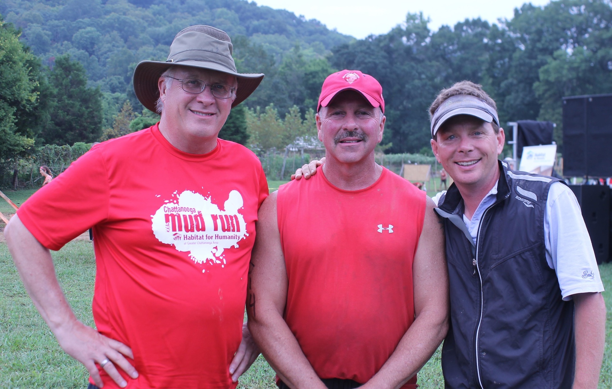David Butler, Habitat executive director; Ed Emerson representing Capital Toyota, sponsor of the Chattanooga Mud Run; and Jason Farmer, Habitat board chairman and race director of Chattanooga Mud Run.