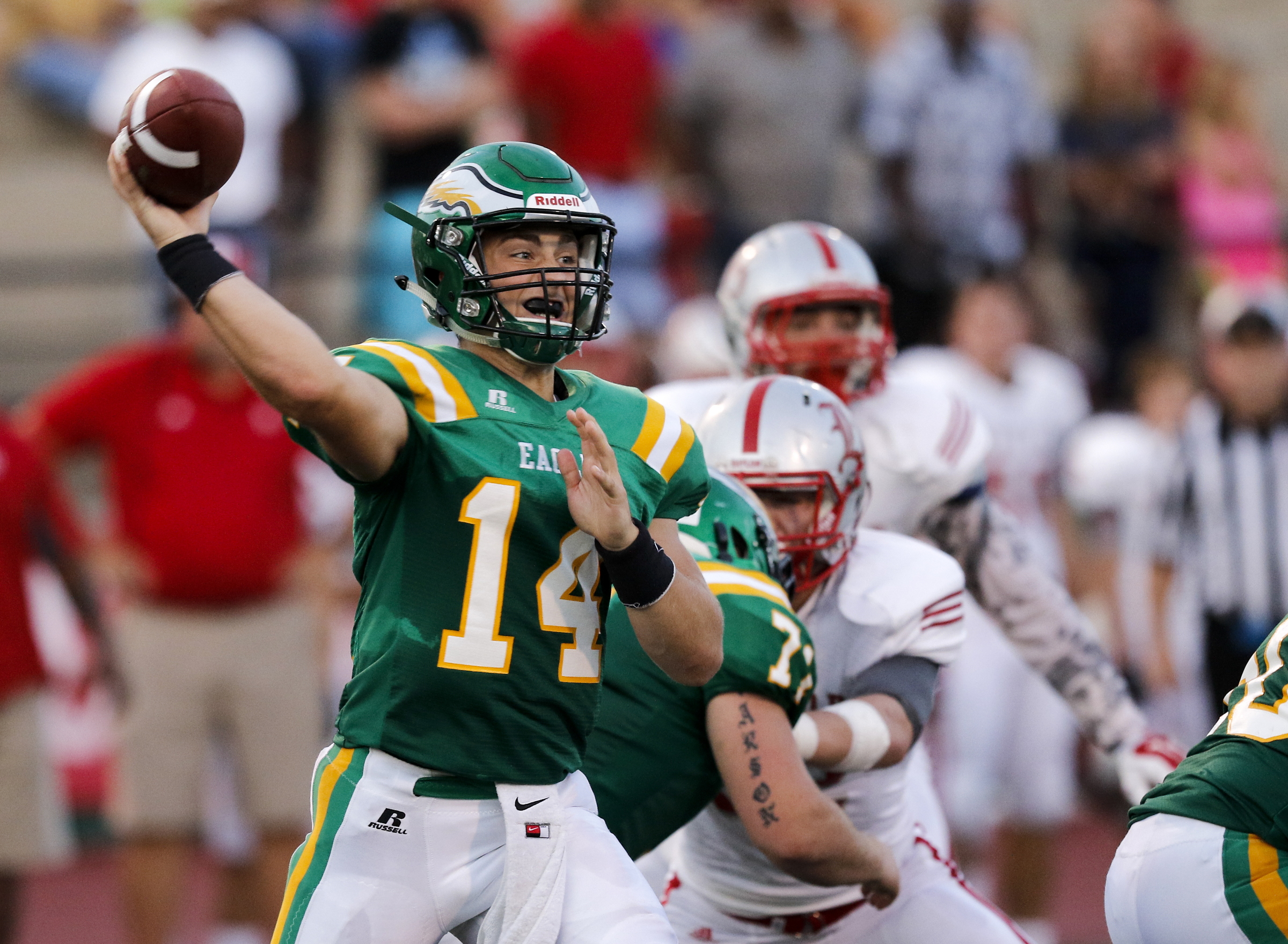 Rhea County quarterback Daniel Dotson passes during their prep football game against Baylor at Rhea County High School on Thursday, Aug. 20, 2015, in Evensville, Tenn.