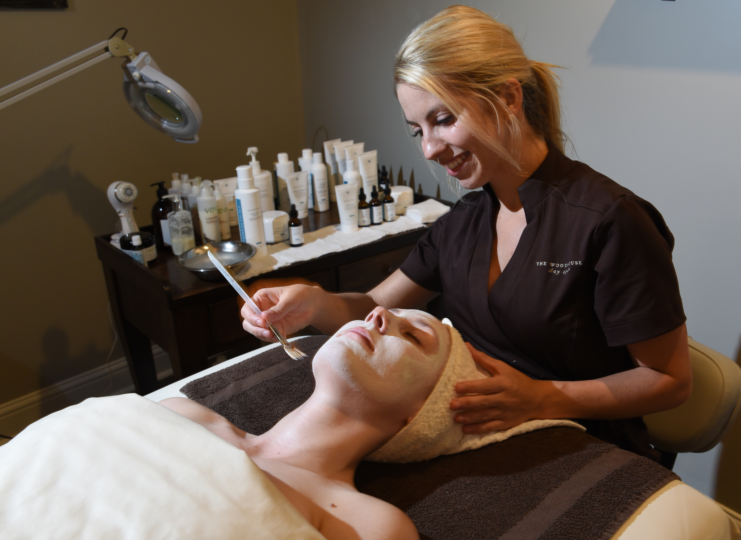 Aesthetician Katheryn Golden gives an illuminating facial to MeKenna Lamons.
