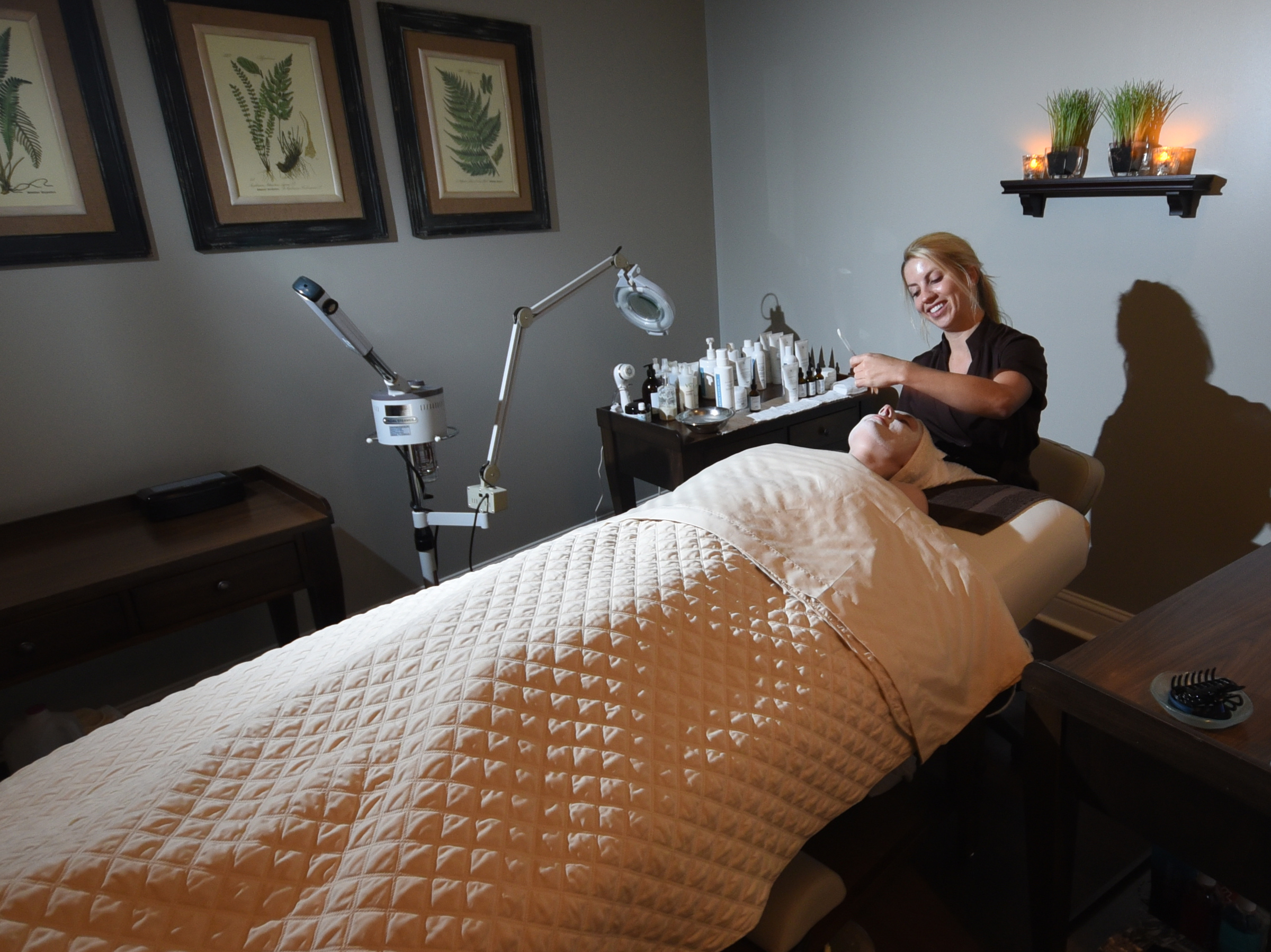 Aesthetician Katheryn Golden gives an illuminating facial to MeKenna Lamons in a private room at the Woodhouse Spa at Warehouse Row. The high-end spa is based in Nashville.