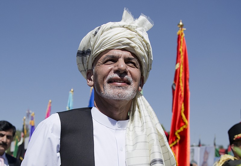 
              In this Wednesday, Aug. 19, 2015 photo, Afghanistan President Ashraf Ghani listens to the national anthem after putting flowers on the "Independence Minaret" monument during an Independence Day ceremony in Kabul, Afghanistan. While leaders of the Afghan Taliban meet to resolve the leadership turmoil that has engulfed the group since their one-eyed leader Mullah Mohammad Omar was revealed to be dead, Afghanistan’s relationship with Pakistan is deteriorating at a dangerous juncture in the war, with the neighboring countries trading blame for stoking tensions and President Ashraf Ghani accusing Islamabad of sponsoring the insurgency now nearing its 14th year with almost 5,000 civilian deaths so far this year.  (AP Photo/Massoud Hossaini)
            
