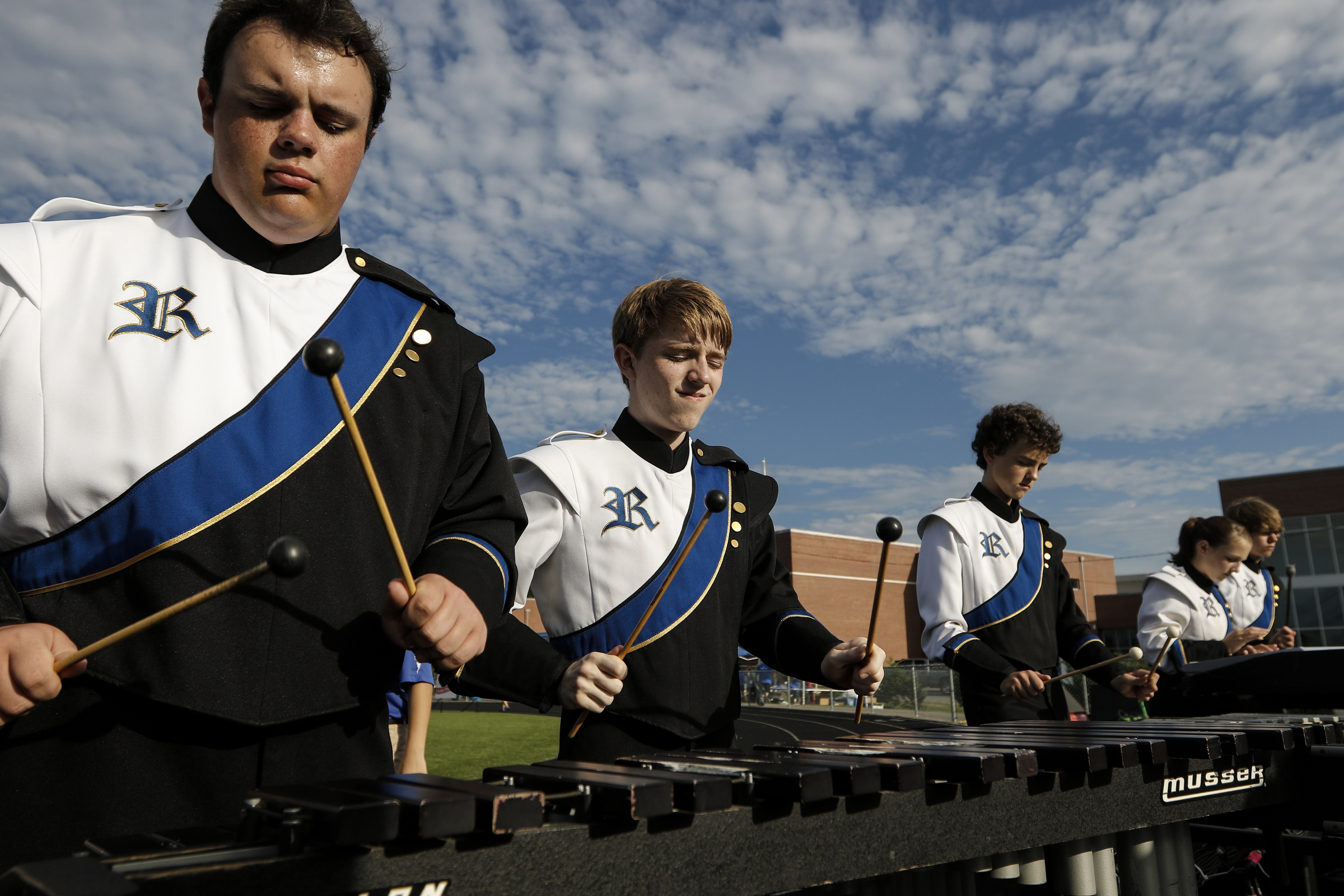Ringgold band members Jacob Walker, left, and Christopher Beatty warm up before their team's prep football game against Northwest Whitfield at Ringgold High School on Saturday, Aug. 22, 2015, in Ringgold, Ga.