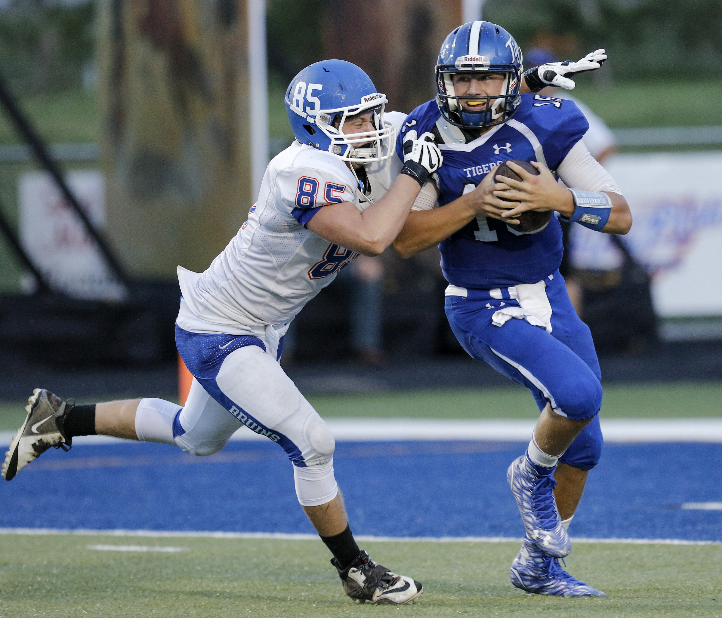 A Northwest Whitfield defender sacks Ringgold quarterback Devin Lancaster during their prep football game at Ringgold High School on Saturday, Aug. 22, 2015, in Ringgold, Ga.