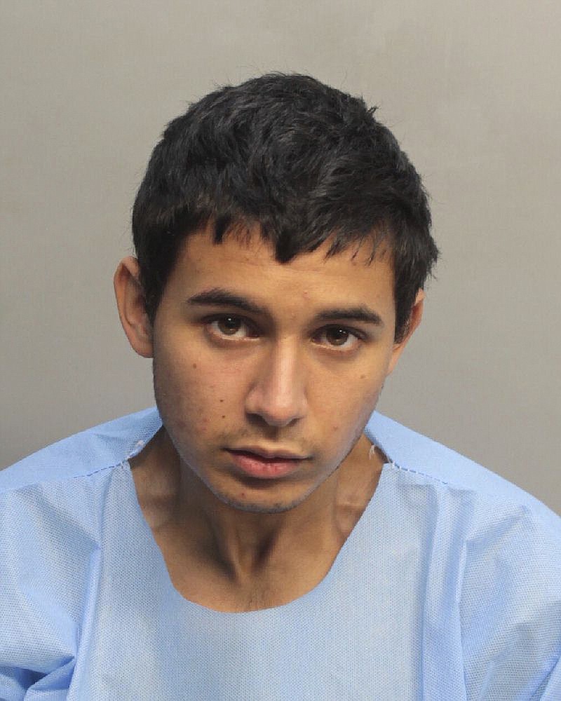 
              This undated photo made available by the Miami-Dade Corrections Dept., shows Christian Colon, one of four South Florida vocational school students that have been charged with second-degree murder after their classmate, Jose Amaya Guardado, 17, was attacked with a machete and left to die in a shallow grave near the school, according to an arrest report. The suspects were students at Homestead Job Corps, a live-in school and vocational training program for at-risk students run by the U.S. Department of Labor. (Miami-Dade Corrections Dept. via AP)
            