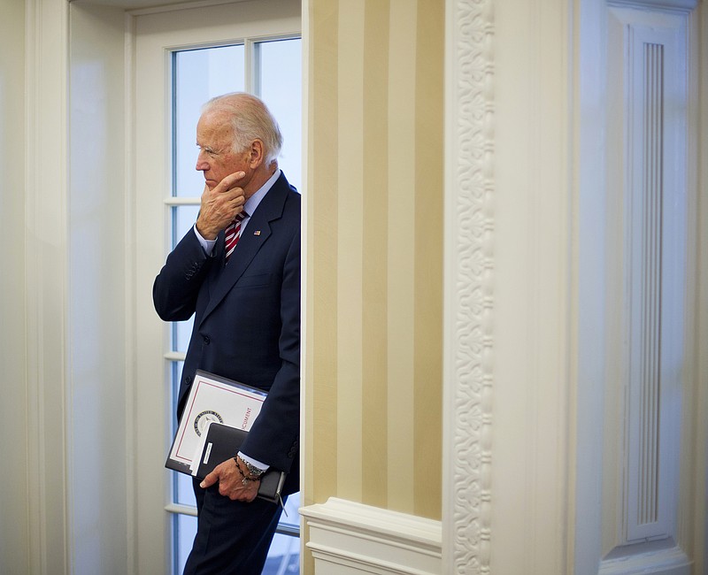 
              FILE - In this May 26, 2015 file photo, Vice President Joe Biden listens to remarks to the media during a meeting between President Barack Obama and NATO Secretary General Jens Stoltenberg in the Oval Office of the White House in Washington. Although Biden has yet to make a decision on a run for the presidency, his advisers say the discussions taking form in the last several weeks are serious enough that the vice president and his associates have started gaming out mechanics like fundraising, ballot deadlines and an early primary state strategy.  (AP Photo/Pablo Martinez Monsivais, File)
            