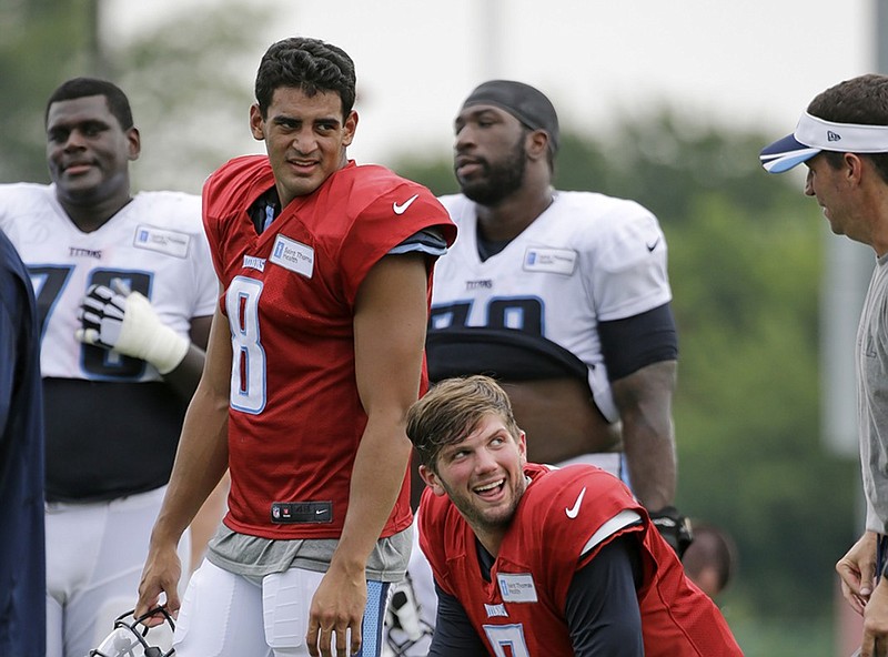 Tennessee Titans quarterbacks Marcus Mariota, left, and Zach Mettenberger both showed promise during Sunday night's preseason victory against the St. Louis Rams in Nashville. Mariota is a rookie and the No. 2 overall draft pick of 2015, while Mettenberger is entering his second season in the NFL and started several games for the Titans last year.