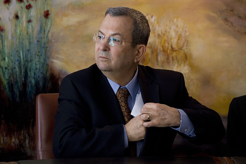 
              FILE - In this Monday Jan. 17, 2011 file photo, Former Israeli Defense Minister Ehud Barak attends a press conference at the Knesset, Israel's parliament, in Jerusalem. Former Defense Minister Ehud Barak’s comments that Israel came close to ordering an attack on Iran’s nuclear facilities but was thwarted by military men and cowardly politicians could shake up Israeli politics. The leaked interview, in which Barak also described Prime Minister Benjamin Netanyahu as indecisive and obsessively pessimistic, was the talk of the town Sunday in an Israel obsessed about Iran.  (AP Photo/Bernat Armangue, File)
            