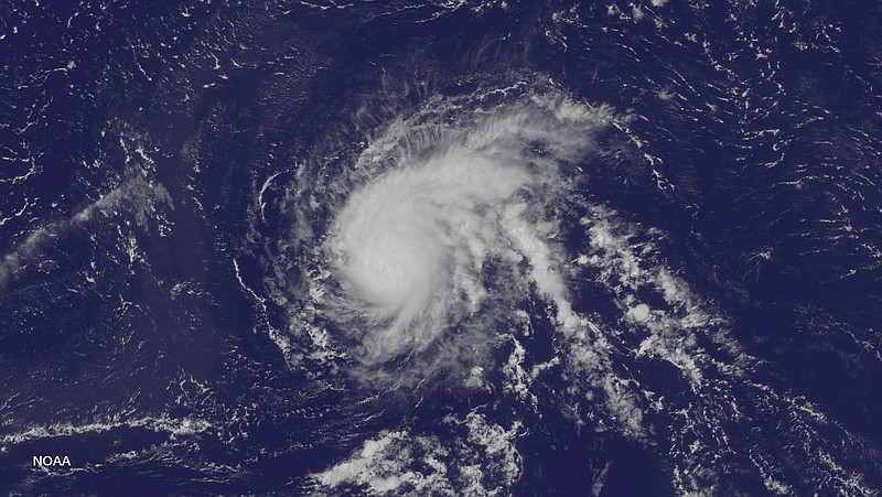 This satellite image take at 1:45 p.m EDT on Friday, Aug. 21, 2015, and released by the National Oceanic and Atmospheric Administration, shows Hurricane Danny over the Atlantic Ocean.