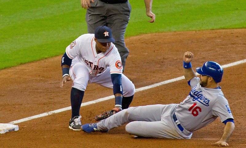 
              Los Angeles Dodgers Andre Ethier is caught stealing as Houston Astros third baseman Jed Lowrie tags him out during the seventh inning of a baseball game Sunday, Aug. 23, 2015, in Houston.  (AP Photo/Richard Carson)
            