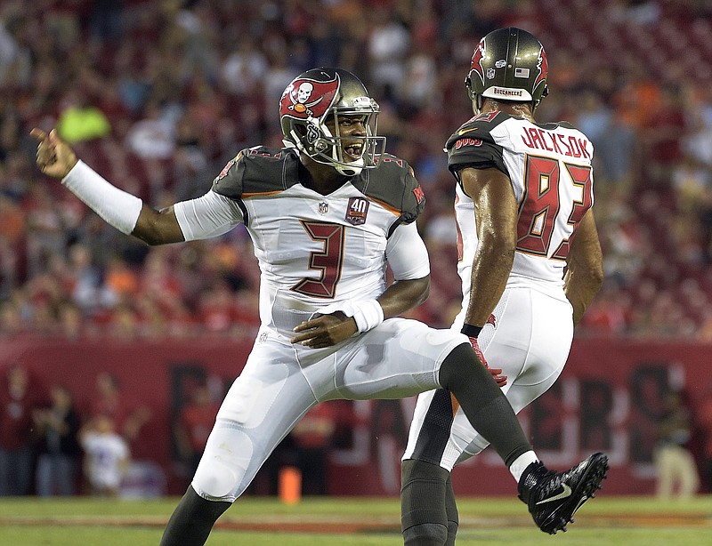 Tampa Bay Buccaneers quarterback Jameis Winston (3) celebrates with wide receiver Vincent Jackson (83) after Winston scored a touchdown against the Cincinnati Bengals during the first quarter of an NFL preseason football game Monday, Aug. 24, 2015, in Tampa, Fla. (AP Photo/Phelan M. Ebenhack)
            
