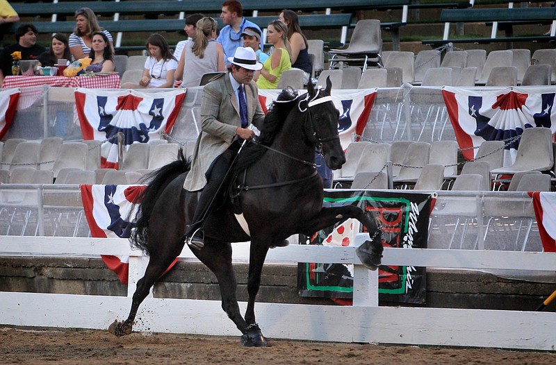 Southern Serenity Ranch Tennessee Walking Horse "Walk Hard" is shown by Patrick Thomas at the Germantown Charity Horse Show in Germantown, Tenn., in 2012.