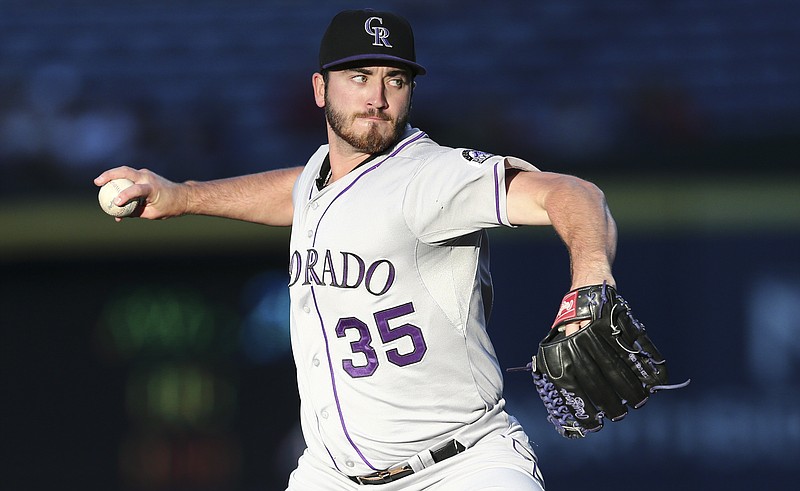 Colorado Rockies starting pitcher Chad Bettis (35) works in the first inning of a baseball game against the Atlanta Braves on Tuesday, Aug. 25, 2015, in Atlanta.