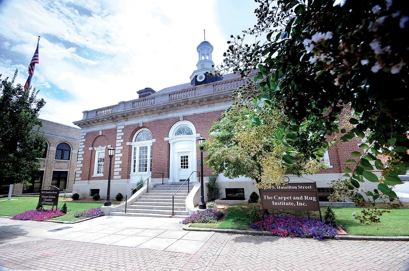 The former library, at 100 S. Hamilton St., now contains the Greater Dalton Chamber of Commerce and The Carpet and Rug Institute, Inc.