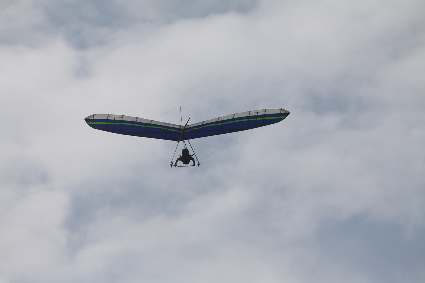 Jul 8, 2013 -
Philip Wipf flies his hang glider above the landing zone of the Lookout Mountain Flight Park on Monday. For Edge Magazine.