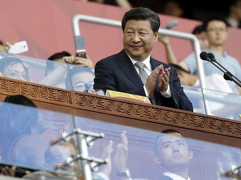 Chinese President Xi Jinping attends the opening ceremony of the World Athletics Championships at the Bird's Nest stadium in Beijing, in this Aug. 22, 2015, file photo. 