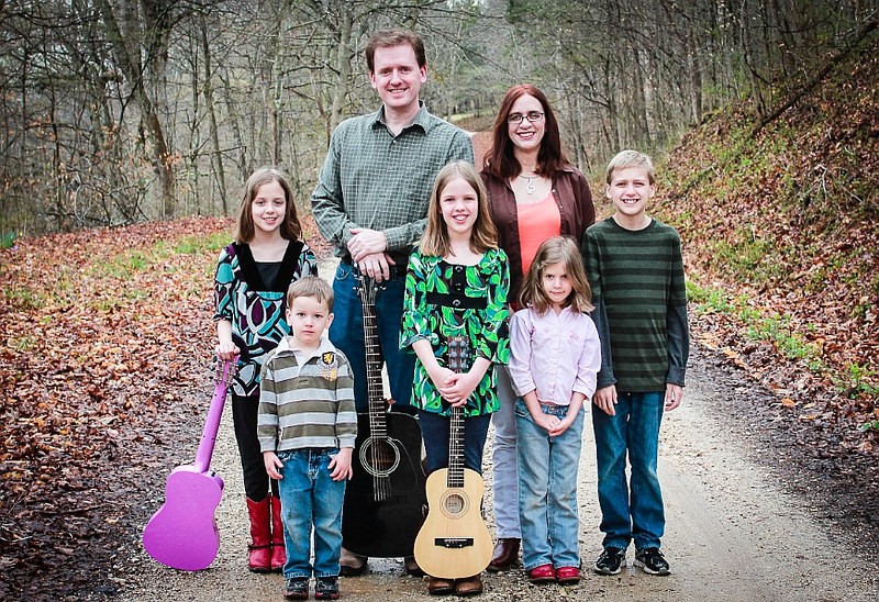 The Mays 
family also includes 
two younger children, 
in front, Jonathan, 4 
and Caroline, 5.
