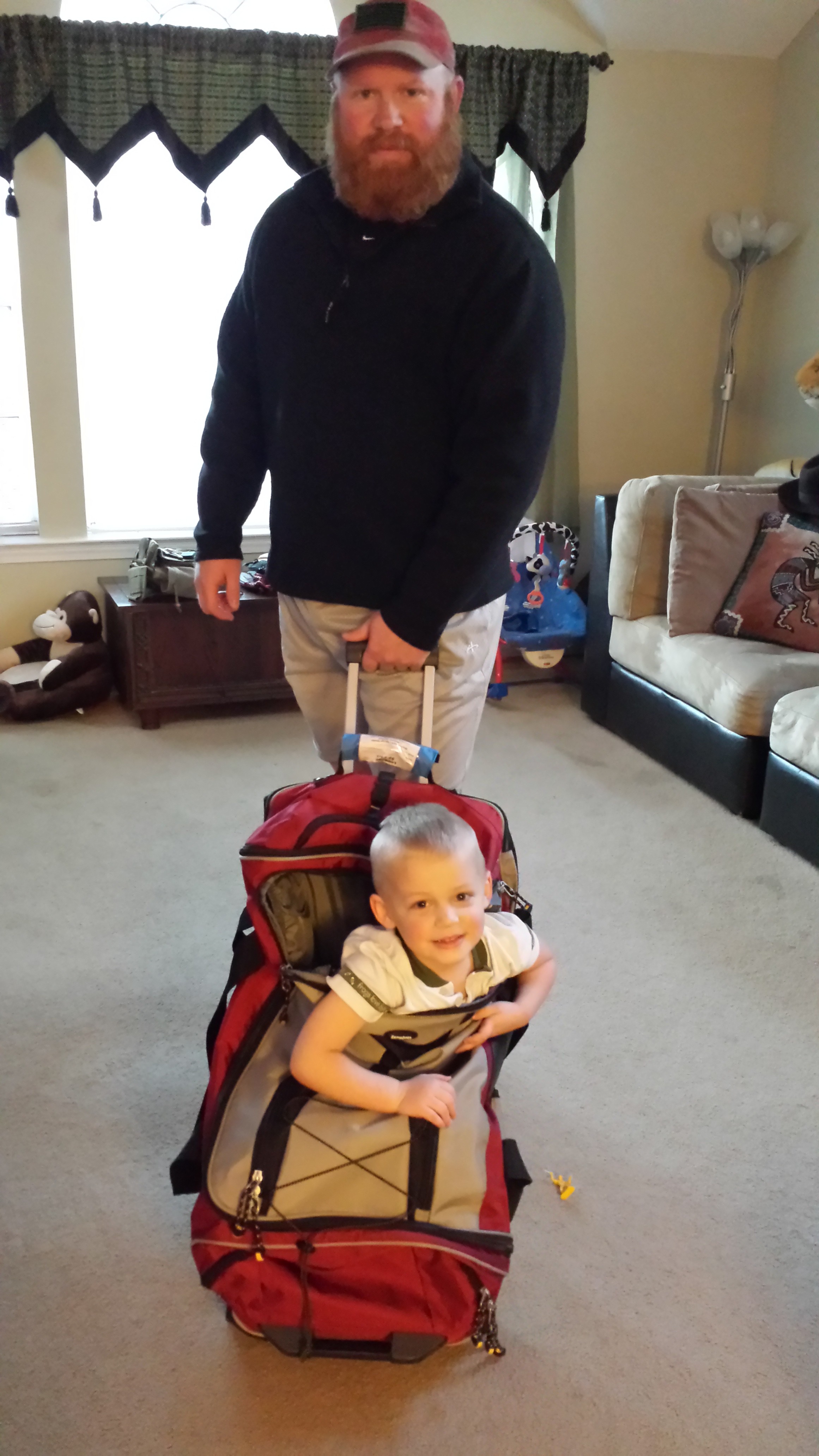 Dr. David Powers and his "wee lad," 4-year-old Gideon, get ready to head for Roanoke, Va.