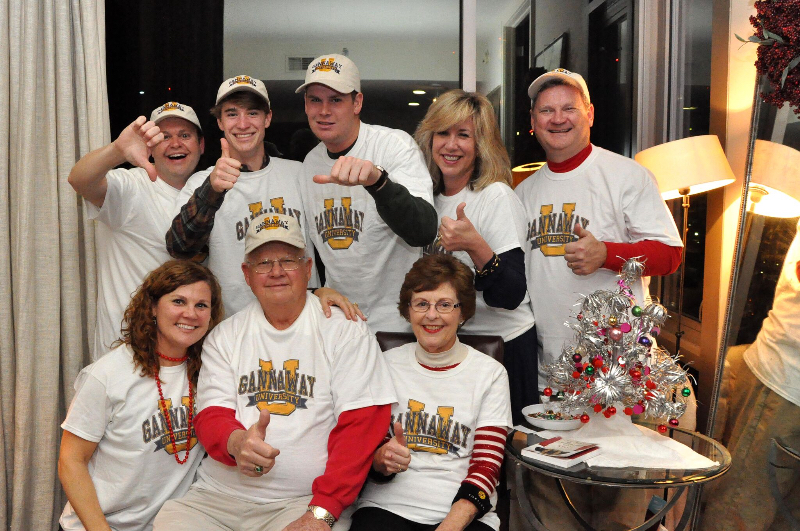 The George Gannaway Family decide to the last Christmas holiday with daughter Ellen Lail in Atlanta … note the "large" Christmas tree. And, as a present, all of them got T-shirts that say: "Gannaway University." The front row, from left to right, are Ellen Gannaway Lail and George and Ginny Gannaway, while the back row, left to right are son-in-law Mike Lail, grandsons Cole and Neil Gannaway, and their parents, Sandy and Sam Gannaway.