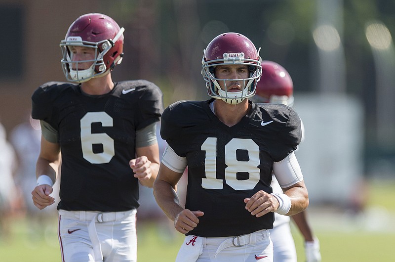 Alabama quarterback Cooper Bateman (18) jogs between drills during NCAA college football practice, Thursday, Aug. 27, 2015, in Tuscaloosa, Ala. Quarterback Blake Barnett (6) is at left. (Vasha Hunt/AL.com via AP)