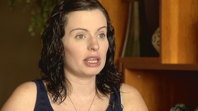 
              In this Aug. 25, 2015 photo provided by KUSA-TV, expectant mother Amber McCullough is pictured during an interview with Colorado's KUSA-TV, a day before she was to give birth to conjoined twins in Aurora, Colo. McCullough, of Hastings, Minn., was scheduled to deliver twin girls at the Colorado Fetal Care Center at Children's Hospital Colorado by C-section on Wednesday, Aug. 26, 2015. Hospital officials said Wednesday they had no update on the surgery. (KUSA-TV Photo via AP)
            