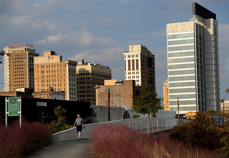 This Oct. 3, 2012, file photo shows buildings behind Railroad Park in downtown Birmingham, Ala.