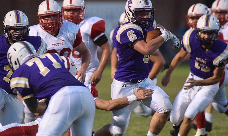 Sequatchie's Alex Turner breaks through the Tiger line for a big gain. The Whitwell Tigers visited the Sequatchie County Indians in TSSAA football action Friday night, August 28, 2015, in Dunlap, Tennessee.