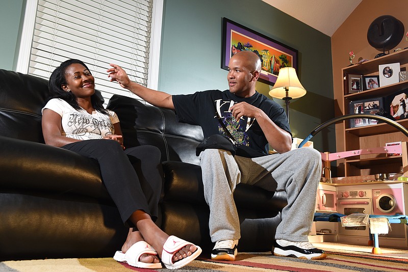 Jacques Irvin, right, talks about what attracted him to Tenesha, his now wife, when they met in Chattanooga after Hurricane Katrina.