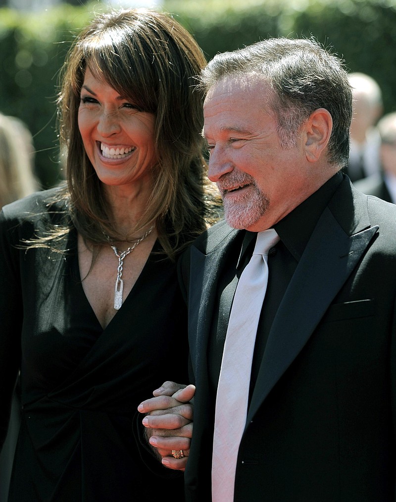 
              FILE - In this Saturday, Aug. 21, 2010, Robin Williams, right, and Susan Schneider arrive at the Creative Arts Emmy Awards in Los Angeles. Attorneys for Robin Williams’ wife and children were due back in court Friday, Aug. 28, 2015, in the ongoing fight over the late actor’s estate. As court documents indicate they remain at odds over the division of Williams’ personal items and a reserve fund to maintain Susan Williams in the home she shared with Robin Williams. (AP Photo/Chris Pizzello, File)
            