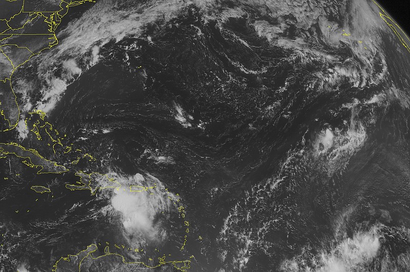 
              This NOAA satellite image taken Friday, Aug. 28, 2015 at 9:45 AM EDT shows a poorly organized Tropical Storm Erika located just to the Southwest of Puerto Rico. Erika currently has winds of 50 miles an hour and is producing heavy rainfall over Hispaniola and the surrounding islands in the Eastern Caribbean. Erika will continue moving to the west-northwest over Hispaniola. Fair weather can be expected across the rest of the Caribbean with only typical summertime showers and thunderstorms. (Weather Underground via AP)
            