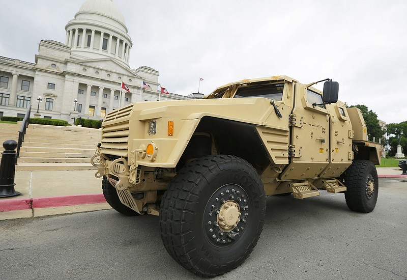 A prototype of a Lockheed Martin Joint Light Tactical Vehicle is parked in front of the Arkansas state Capitol in Little Rock, Ark., in this file photo taken May 26, 2015. The Department of Defense announced Tuesday, Aug. 25, 2015, that the defense contract to produce the vehicle is going to Wisconsin-based Oshkosh Corp.