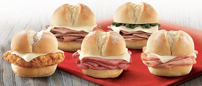 
              This undated photo provided by Arby's shows Arby’s new lineup of sliders. After years of pushing super-sized portions, fast-food chains are starting to see the perks of going small. (Arby's via AP)
            