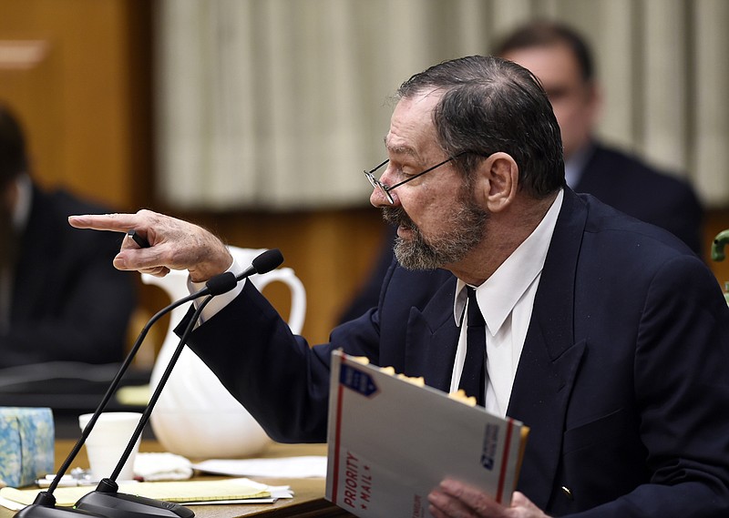 Frazier Glenn Miller Jr., a white supremacist charged with killing three people at two Jewish sites near Kansas City, argues with the prosecutor in Olathe, Kan., in this Aug. 24, 2015, file photo.