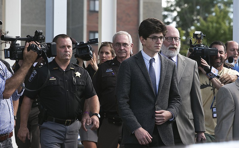 Owen Labrie leaves Merrimack Superior Court with his attorney Jay Carney in Concord, N.H. , on Friday, Aug. 28, 2015 in Concord, N.H. 